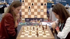 Hungarian Teen Stuns Chess World: Muzychuk Suffers Time Blunder at Grand Swiss
OR
Grand Swiss Upset: World No. 5 Muzychuk Falls to Rising Star After Clock Mishap
OR
Time Trouble Costs Muzychuk Dearly: Teenager Gaál Scores Shock Win at Grand Swiss
